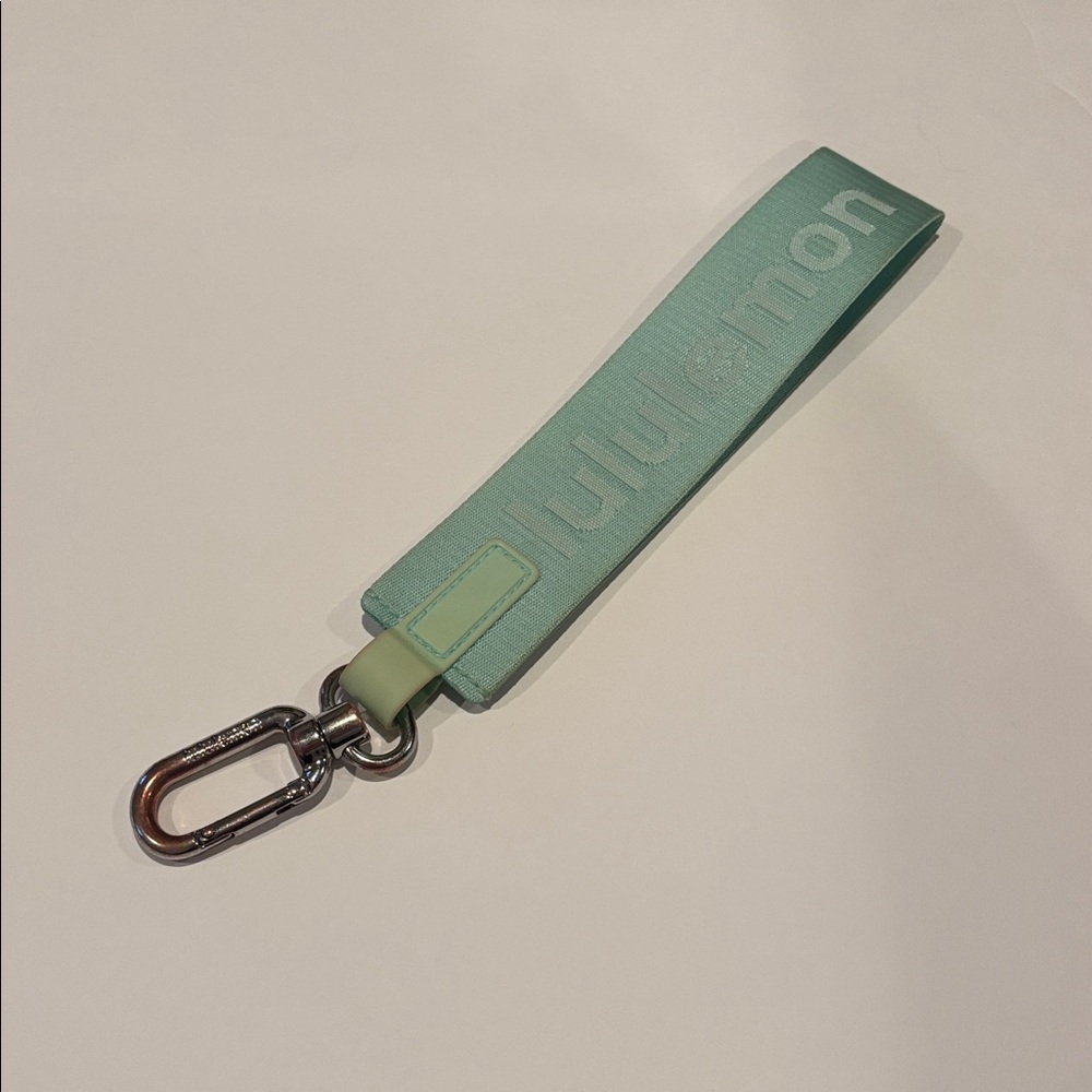Lululemon mint green wristlet key strap with silver hardware